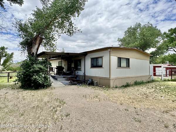 2.83 Acres of Residential Land with Home for Sale in Bloomfield, New Mexico