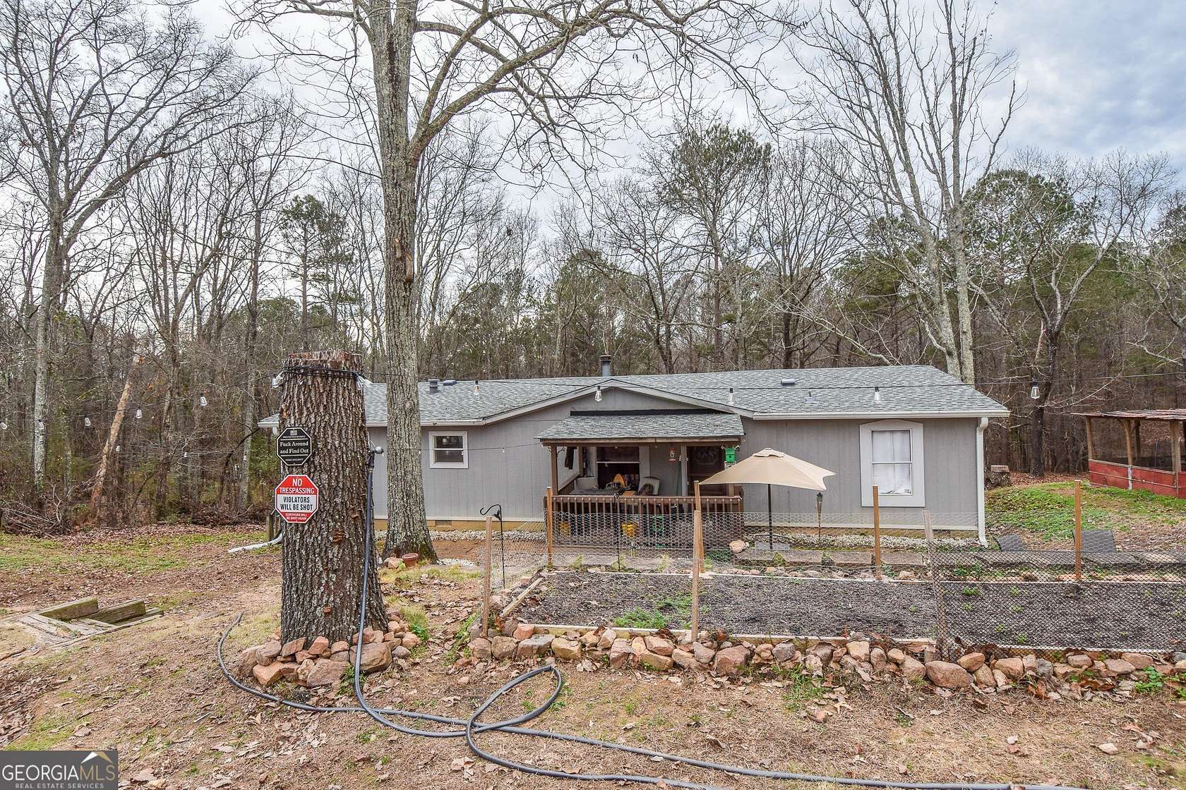 13.9 Acres of Land with Home for Sale in Thomaston, Georgia