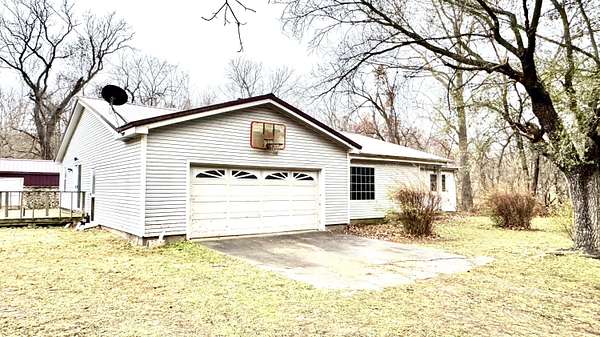 48.7 Acres of Recreational Land with Home for Sale in Wyandotte, Oklahoma