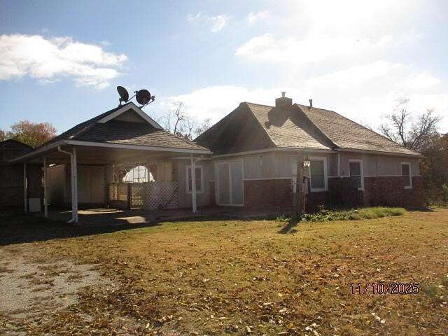 3.83 Acres of Residential Land with Home for Sale in Wyandotte, Oklahoma