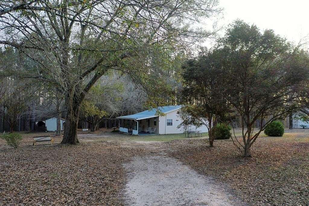 14.8 Acres of Recreational Land with Home for Sale in Lumberton, Mississippi