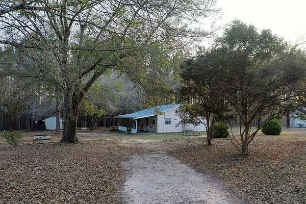 14.8 Acres of Recreational Land with Home for Sale in Lumberton, Mississippi