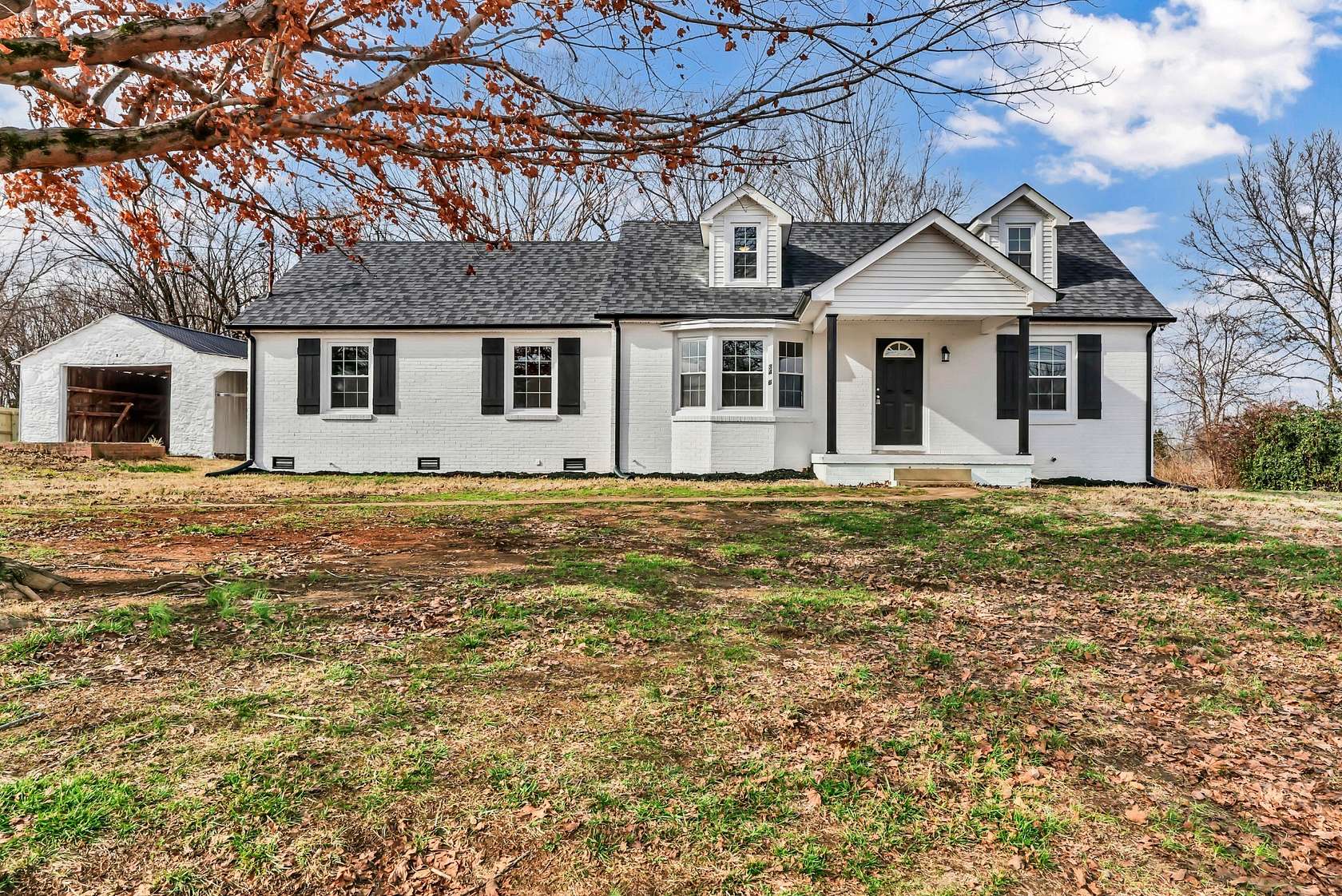 1.5 Acres of Land with Home for Sale in Cunningham, Tennessee