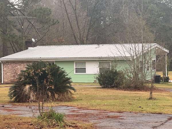 15.6 Acres of Land with Home for Sale in Poplarville, Mississippi