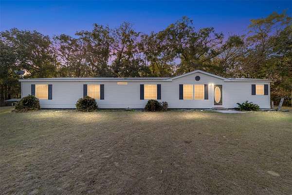 2.48 Acres of Residential Land with Home for Sale in Alachua, Florida
