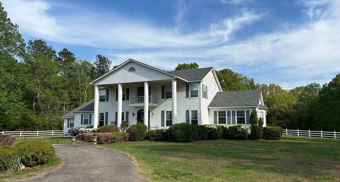 10.6 Acres of Land with Home for Sale in Bolivar, Tennessee