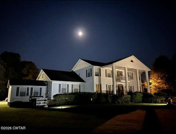 10.6 Acres of Recreational Land with Home for Sale in Bolivar, Tennessee