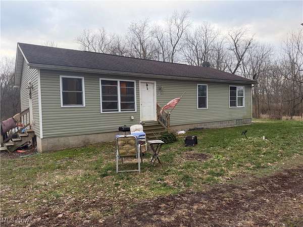 2.48 Acres of Residential Land with Home for Sale in North Lawrence, Ohio