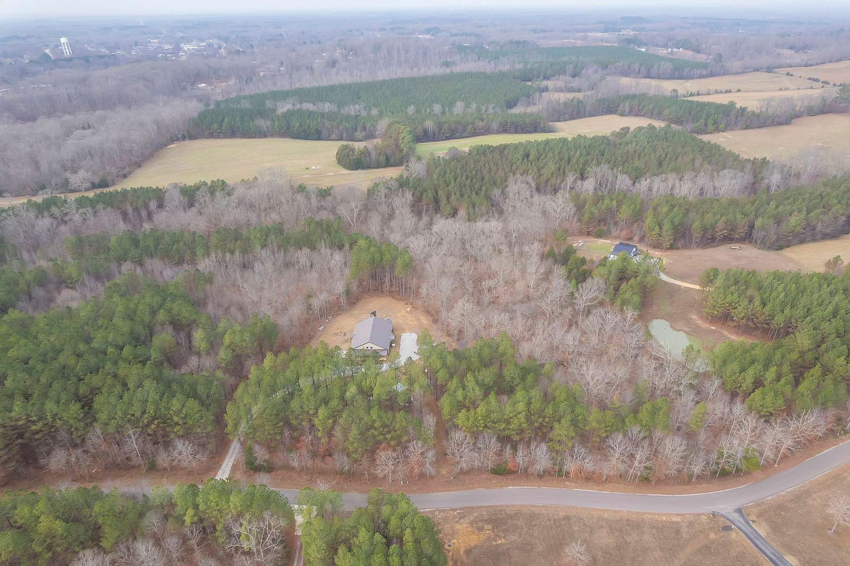 7.86 Acres of Residential Land with Home for Sale in Parsons, Tennessee