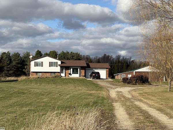 10 Acres of Residential Land with Home for Sale in Lynn Township, Michigan