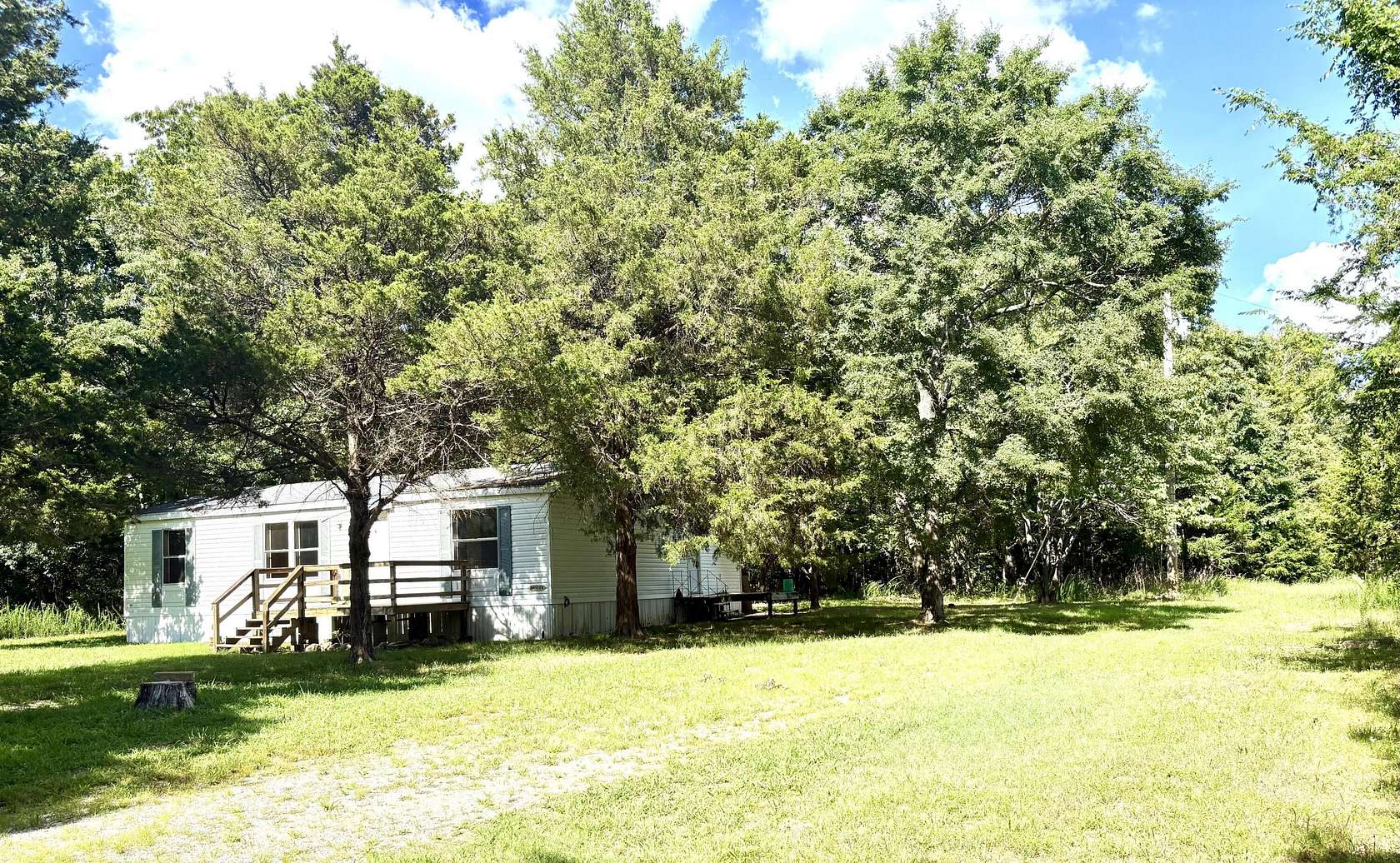 1.5 Acres of Residential Land with Home for Sale in Cedar Creek Township, Missouri