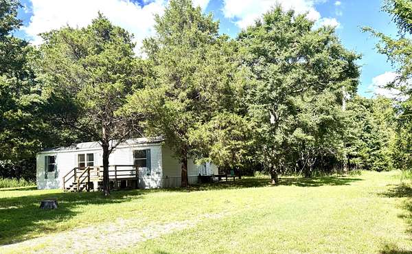 1.5 Acres of Residential Land with Home for Sale in Cedar Creek Township, Missouri