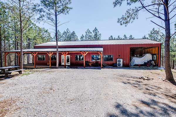 15.8 Acres of Land with Home for Sale in Linden, Tennessee