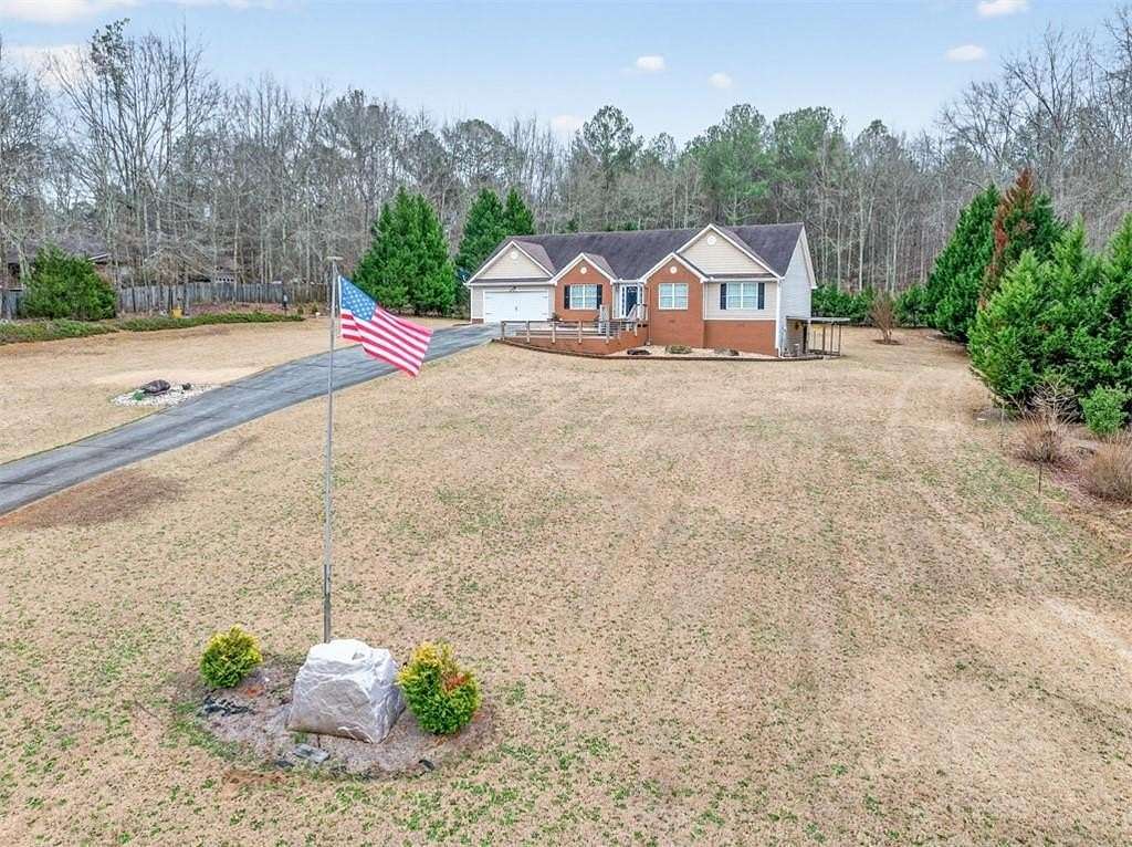 3.75 Acres of Land with Home for Sale in Loganville, Georgia