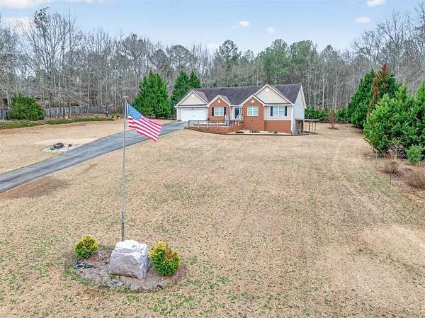 3.75 Acres of Land with Home for Sale in Loganville, Georgia