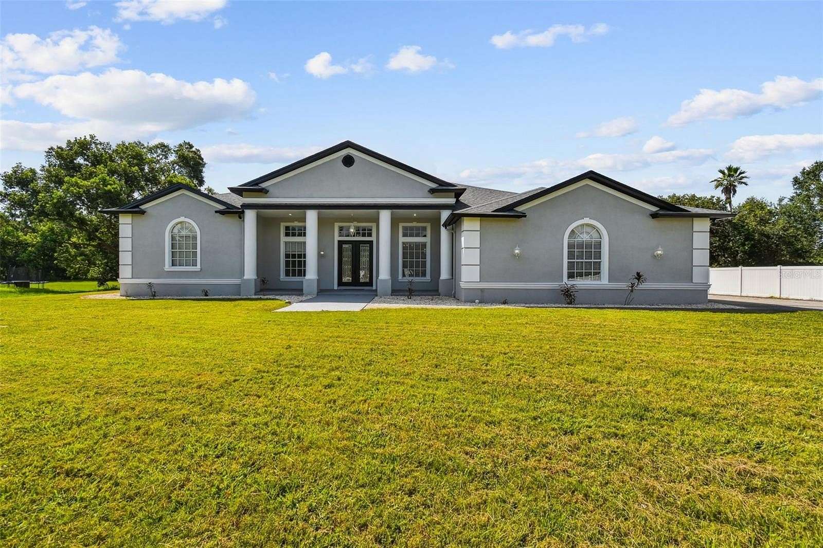 1.69 Acres of Land with Home for Sale in Wesley Chapel, Florida