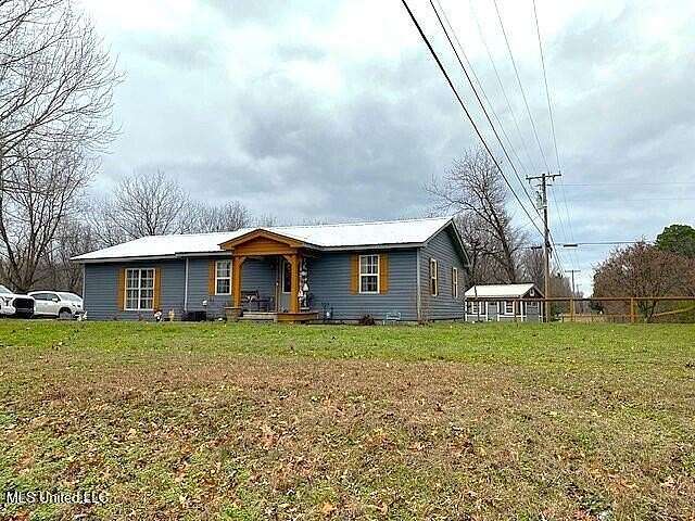 3.15 Acres of Land with Home for Sale in Lake Cormorant, Mississippi