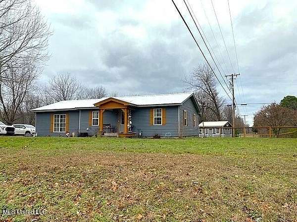 3.15 Acres of Land with Home for Sale in Lake Cormorant, Mississippi