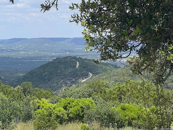 5 Acres of Residential Land with Home for Sale in Pipe Creek, Texas
