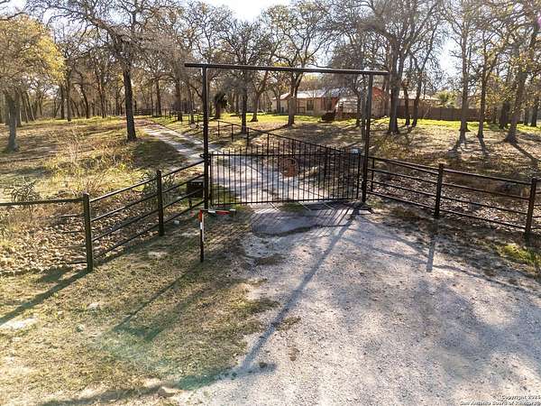 8.49 Acres of Residential Land with Home for Sale in Seguin, Texas