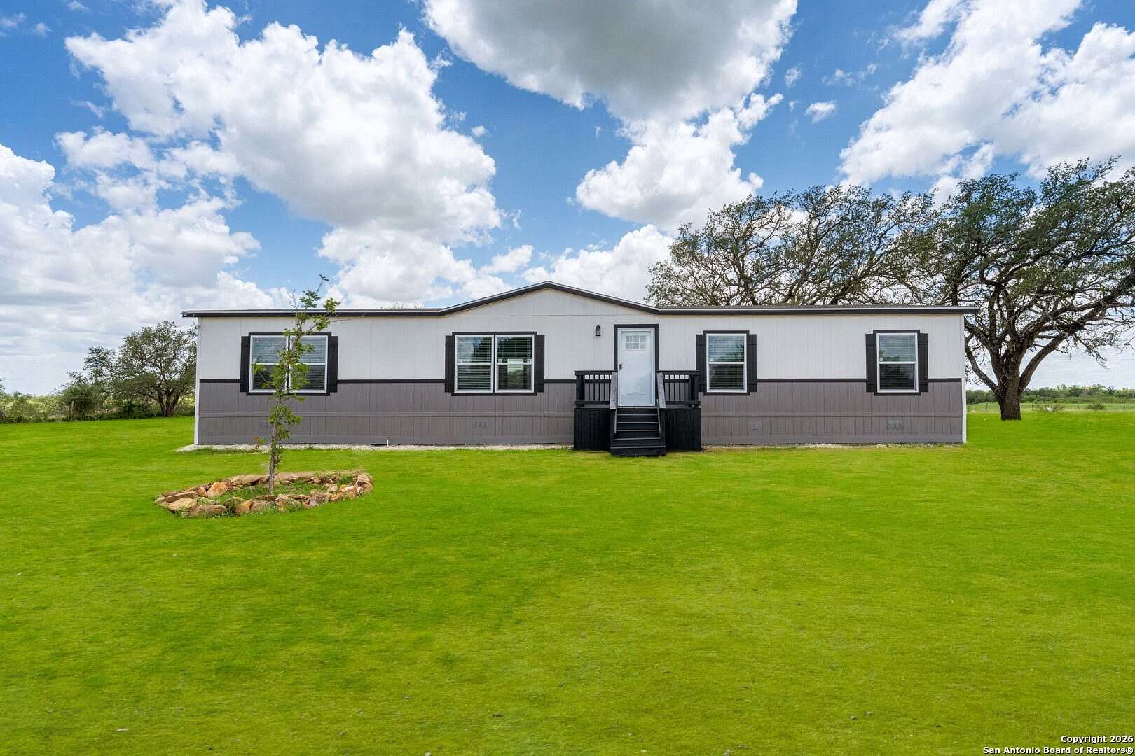 2.23 Acres of Residential Land with Home for Sale in Poteet, Texas