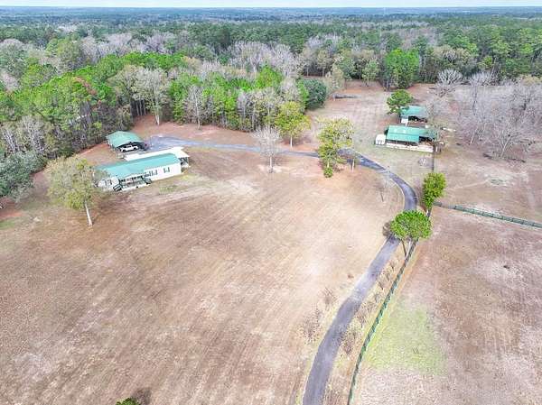 15.8 Acres of Land with Home for Sale in Cairo, Georgia