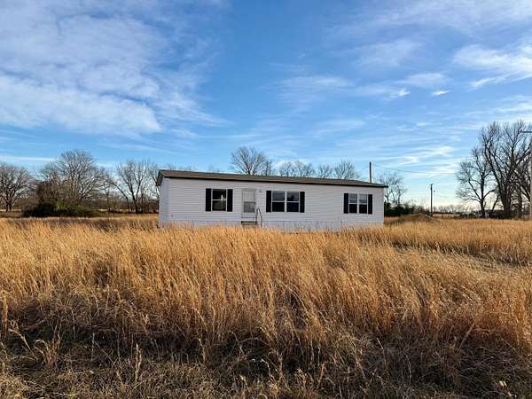 2 Acres of Residential Land with Home for Sale in Big Cabin, Oklahoma