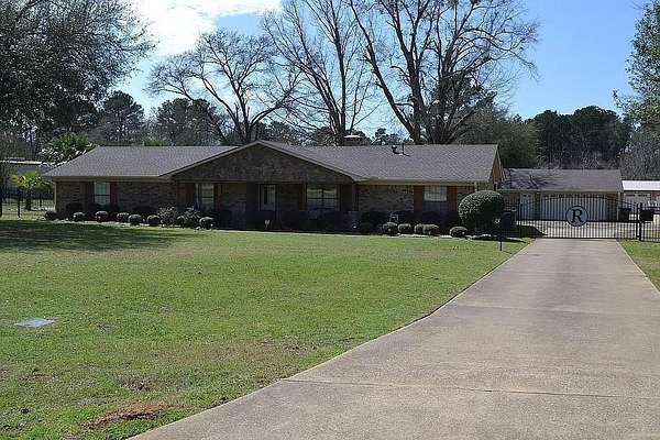 4.8 Acres of Residential Land with Home for Sale in Longview, Texas