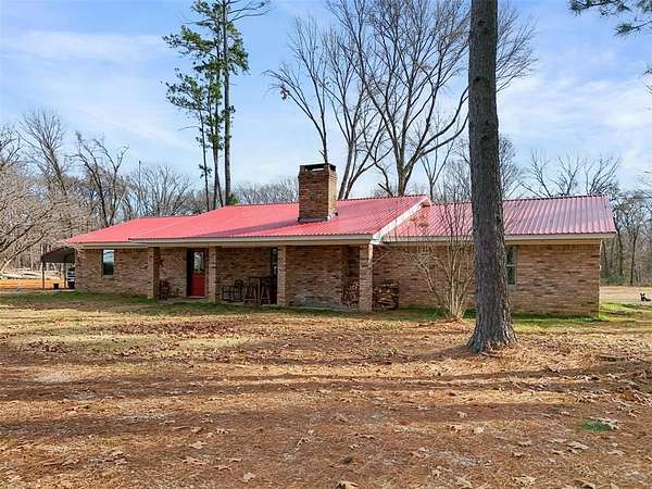 10.4 Acres of Land with Home for Sale in Ravenna, Texas