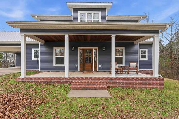 5.6 Acres of Residential Land with Home for Sale in Perryville, Arkansas