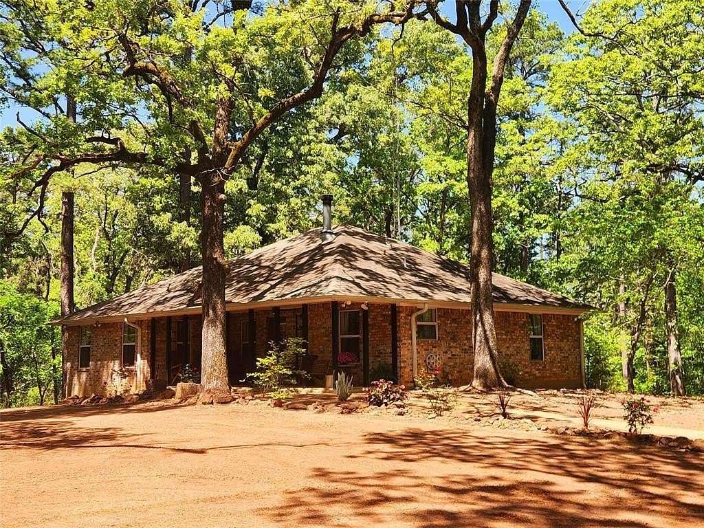 22.8 Acres of Recreational Land with Home for Sale in Lindale, Texas