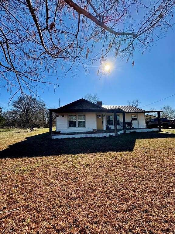 11 Acres of Land with Home for Sale in Deport, Texas