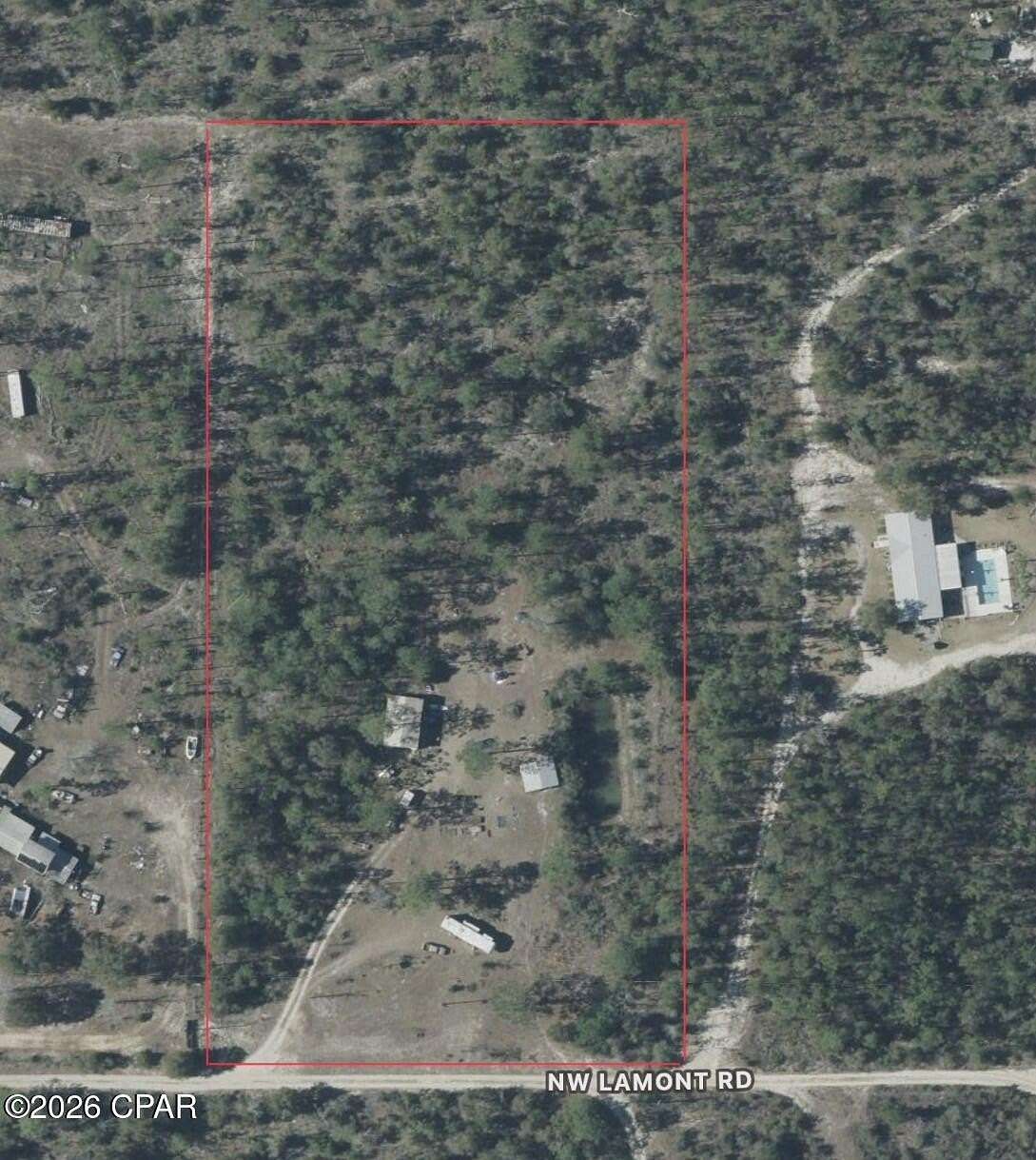 5 Acres of Residential Land with Home for Sale in Fountain, Florida