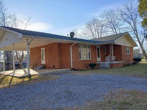 2.49 Acres of Residential Land with Home for Sale in White Bluff, Tennessee