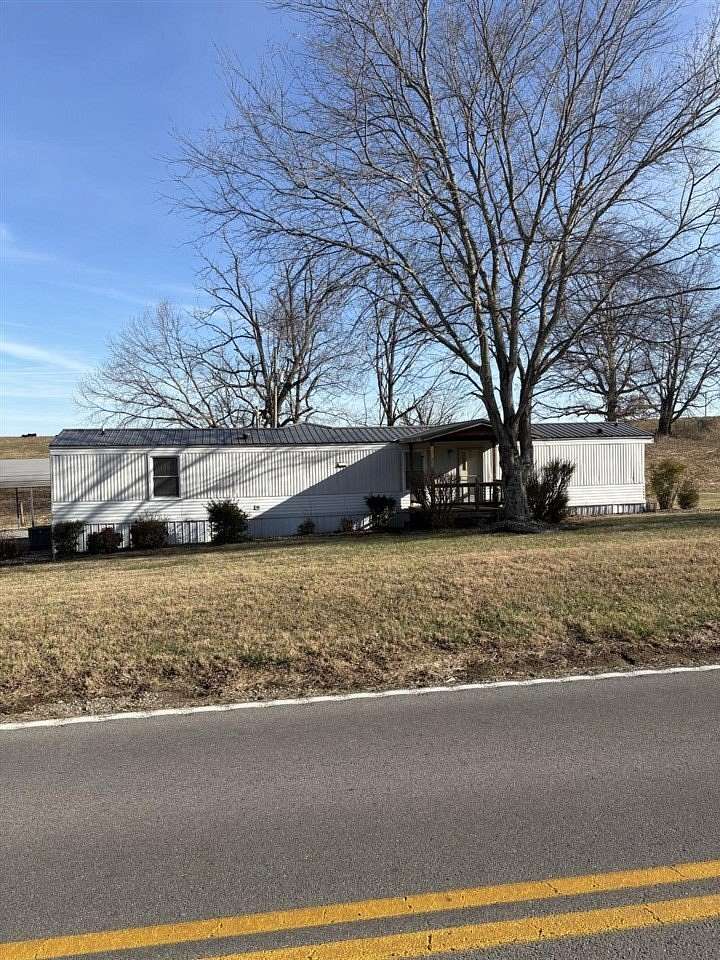 2.82 Acres of Residential Land with Home for Sale in Scottsville, Kentucky