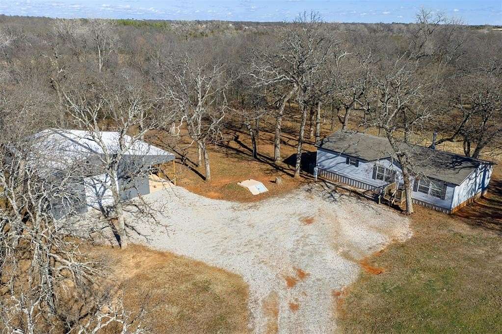 5 Acres of Residential Land with Home for Sale in Tecumseh, Oklahoma