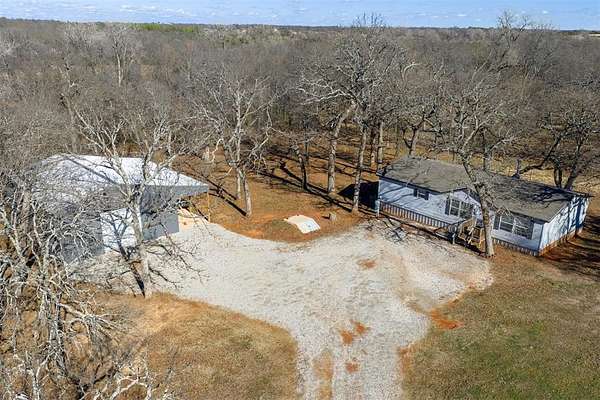 5 Acres of Residential Land with Home for Sale in Tecumseh, Oklahoma