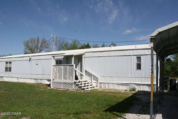 3 Acres of Residential Land with Home for Sale in Neosho, Missouri