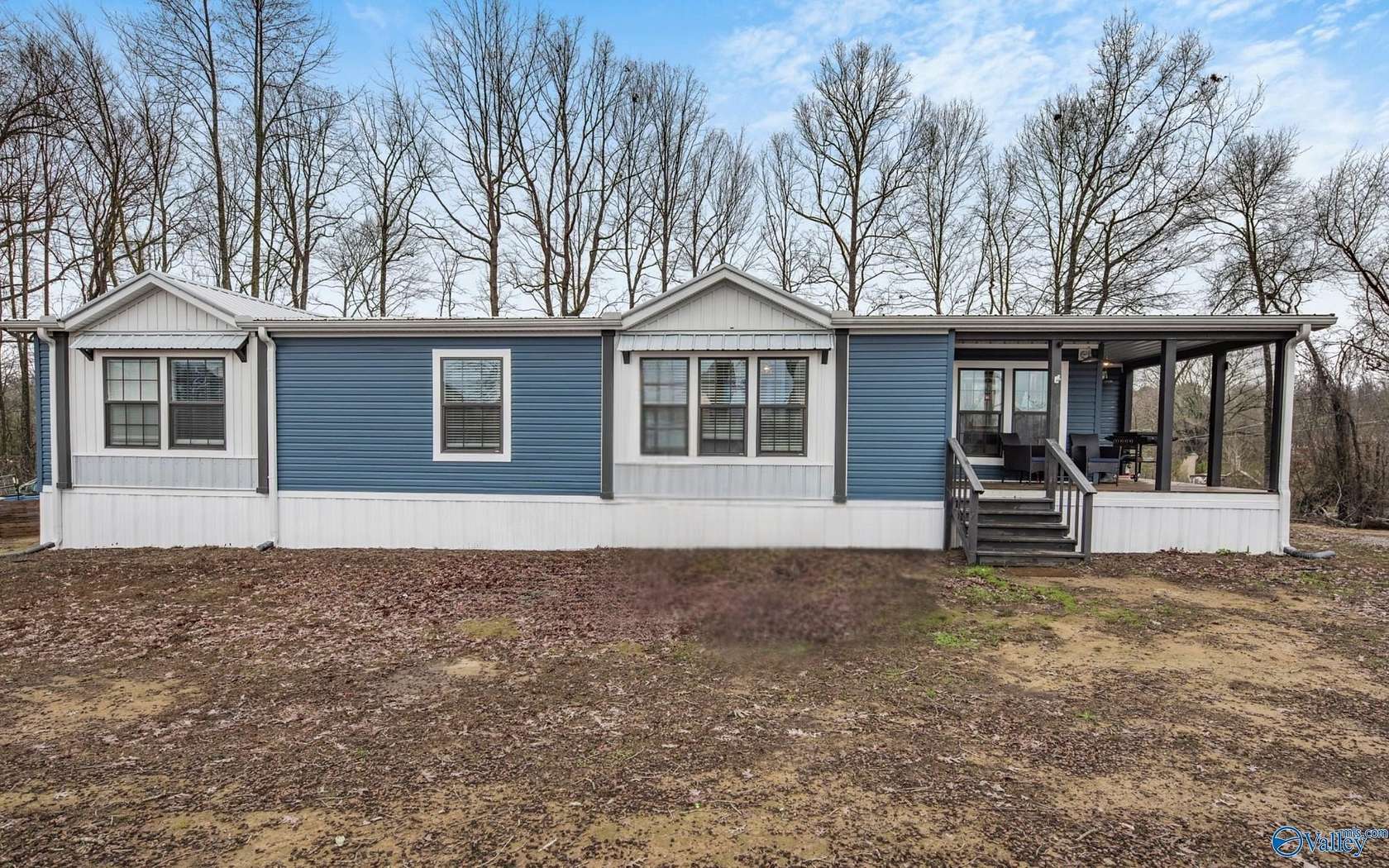 4.6 Acres of Land with Home for Sale in Falkville, Alabama