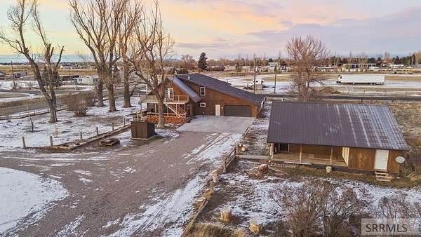 2.8 Acres of Residential Land with Home for Sale in Rigby, Idaho
