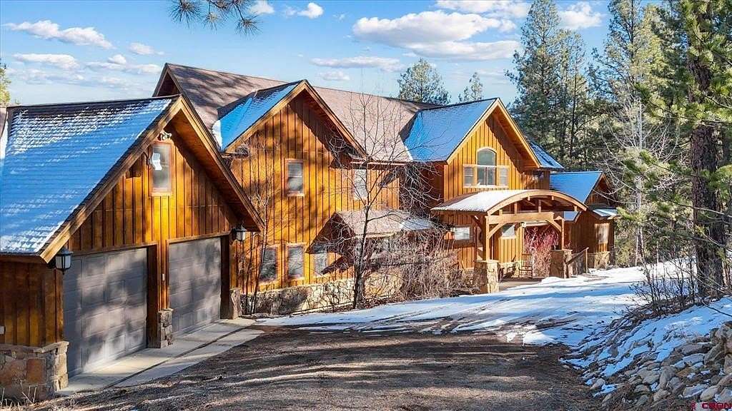 5.1 Acres of Residential Land with Home for Sale in Pagosa Springs, Colorado