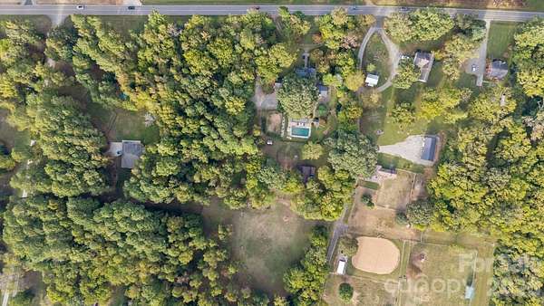 14.9 Acres of Land with Home for Sale in Huntersville, North Carolina