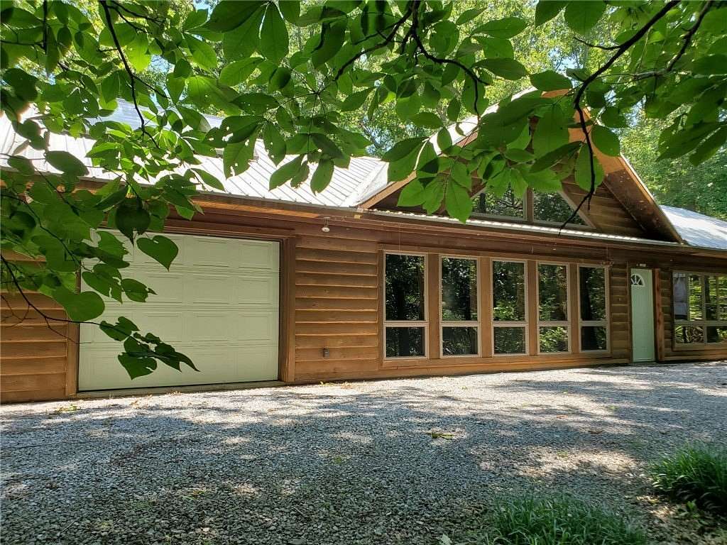 47 Acres of Recreational Land with Home for Sale in Noel, Missouri