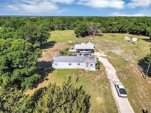 4.28 Acres of Residential Land with Home for Sale in Mount Dora, Florida