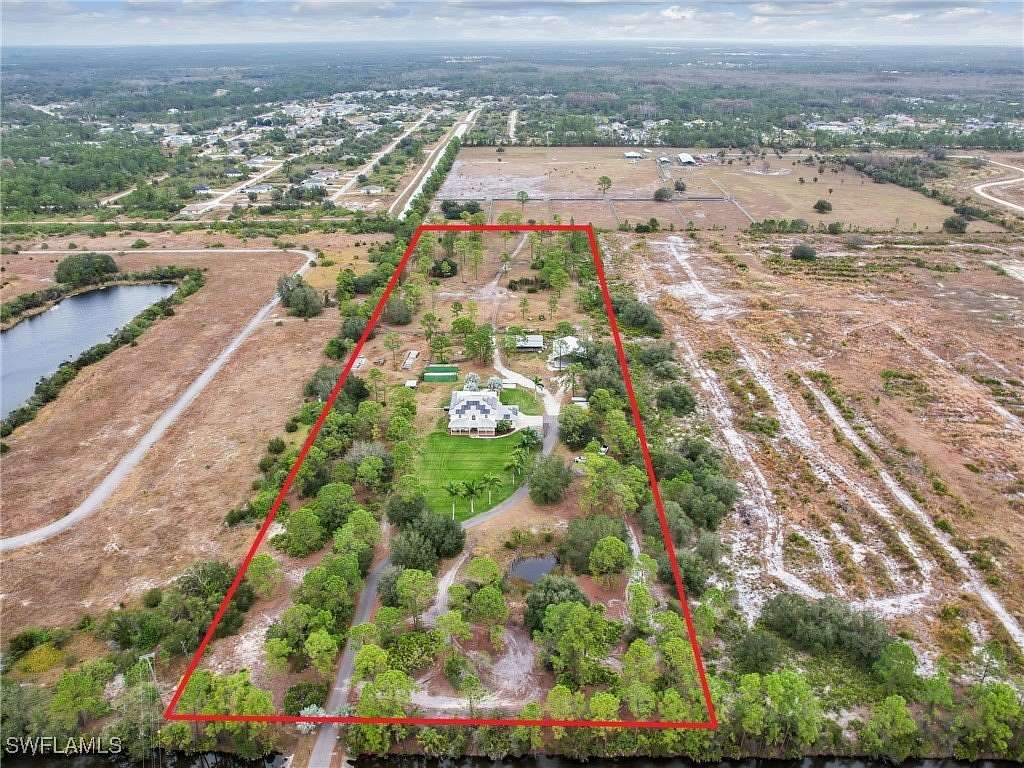 10.2 Acres of Land with Home for Sale in Lehigh Acres, Florida