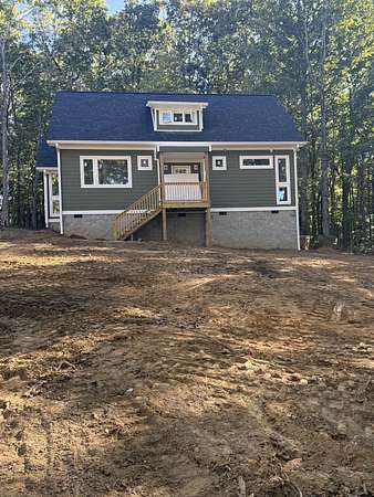 1.5 Acres of Residential Land with Home for Sale in Charlotte, Tennessee