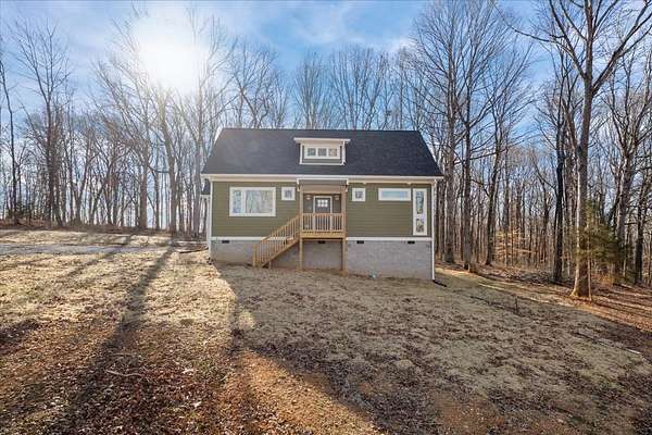 1.5 Acres of Residential Land with Home for Sale in Charlotte, Tennessee