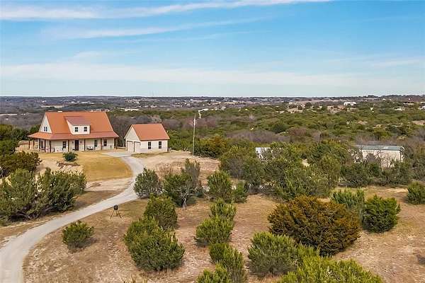 9.75 Acres of Residential Land with Home for Sale in Weatherford, Texas