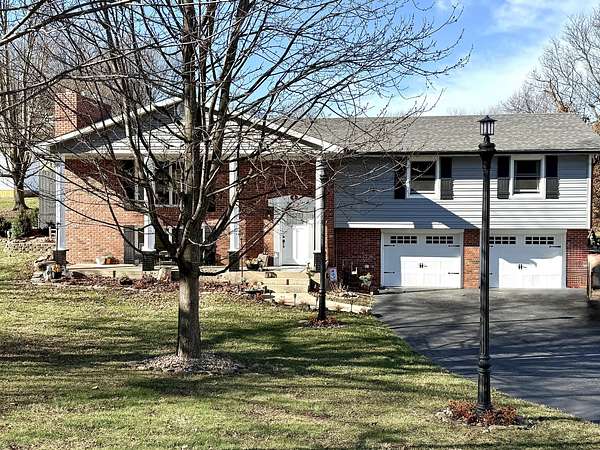 1.7 Acres of Residential Land with Home for Sale in Monett, Missouri