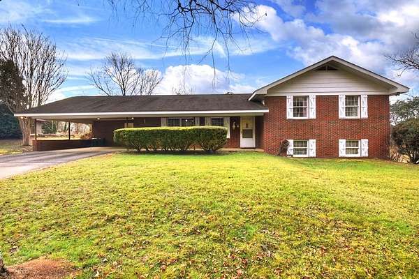 1.64 Acres of Residential Land with Home for Sale in Copperhill, Tennessee